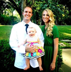 Class of 2017's Adam Rosa at MBKU's White Coat Ceremony with his wife Brittany and daughter Joselyn
