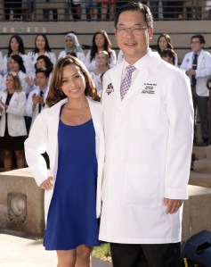First Year Student Cynthia Palma at her White Coat Ceremony with Dean Woo