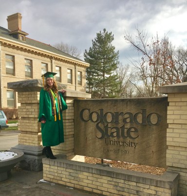Undergrad graduation pic with Colorado State sign